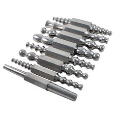 a set of six stainless steel kitchen utensils with screws and thumb holes