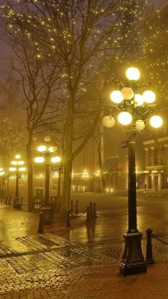 an empty street at night in the rain