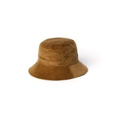 Bucket hat made in organic corduroy in a warm amber shade. The inside is neatly finished, all seams piped with ecru cotton tapes. Logo label on the outside. Classic Brown Bucket Hat With Flat Brim, Brown Cotton Flat Brim Bucket Hat, Brown Cotton Bucket Hat With Curved Brim, Brown Cotton Bucket Hat With Short Brim, Classic Brown Bucket Sun Hat, Brown Bucket Hat With Curved Brim, Brown Corduroy Flat Brim Hat, Brown Corduroy Cap, Spring Outfits 2022