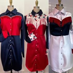 three women's dresses on mannequins with red, white and blue colors