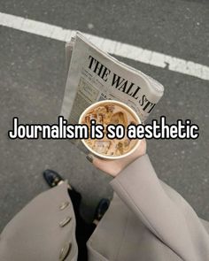 someone holding up a newspaper and a cup of coffee in their hand with the words journalism is so aesthetic