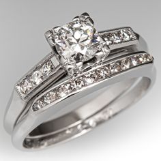 a white gold diamond ring and matching wedding band