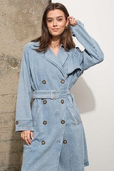 A luxe approach to a classic trench with a double breasted front, pointed collar, wrap around belt and cuffs. Crafted from 100% Cotton for a classic denim look and feel, this chic trench will be your new go-to. With a wide range of styling options, wear with leather leggings or throw over a ribbed knit dress. Double Breasted Oversized Belted 100% Cotton Model is wearing size small Flowy Romper, Denim Trench Coat, Mesh Bodysuit, Ribbed Knit Dress, Top Graphic Tees, La Fashion, Denim Flares, Sweatshirt Dress, Leather Leggings