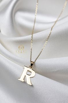 "ABOUT PRODUCT This 14K Solid Gold Initial Pendant necklace is beautifully designed and hand crafted with our associates to make this a special gift for your loved ones. Knowing the value of our customers, We prepare each piece with extra care and attention.  ITEM DETAILS Material: 14K Gold Approx:  1.80 gram     Only Pendant 0.80 gram Available colors: Gold, Rose Gold, White Gold Available Sizes: 14\" to 20\" ✪ 14k Solid Gold ( Certification will be included with your order ) ✪Available 14K Whi Handmade Everyday Necklaces With Initial Pendant, Handmade Everyday Initial Pendant Necklace, Dainty Handmade Initial Pendant Necklace, Gift Name Necklace With Initial Pendant, Tarnish Resistant, Handmade Initial Pendant Name Necklace For Anniversary, Initial Pendant Name Necklace, Tarnish Resistant, Perfect For Gifts, Handmade Initial Pendant Jewelry For Personalized Gift, Tarnish Resistant Initial Pendant Name Necklace For Gift, Dainty Custom Necklace With Initial Pendant For Gift