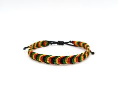 Rasta surfer Bracelet - Rasta bracelet - Reggae bracelet - Macrame bracelet - Surf bracelet Men bracelet - Friendship bracelet - Macrame jewerly - Bob Marley inspired This handmade macrame bracelet is made out of black,red,pale yellow and dark green waxed string. It is water resistant because waxed string is very durable in water. It is adjustable and has a sliding knot closure in order to fit a lot of sizes. Similar fishbone bracelet in my shop: https://www.etsy.com/listing/206501382/surfer-wav Reggae Bracelet, Rasta Bracelet, Fishbone Bracelet, Rat Jewellery, Yellow And Dark Green, Kwanzaa Gifts, Surf Bracelet, Sliding Knot Closure, Rasta Colors