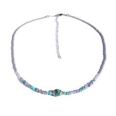 Cool, unique necklace, that will update any outfit! Made with genuine Turquoise and Tanzanite. Delicate and lightweight, perfect for everyday wear! One size fits all. Made in the USA. Ships in 0-3 business days. Turquoise is associated with the Throat chakra and it represents knowledge and divine guidance. It is also an aide in communication, in synchronizing what we mean to say with what is actually said. Tanzanite is a very rare, and powerful crystal that can stimulate your Crown, Third Eye an Turquoise Blue Necklace With Natural Amazonite Stones, Turquoise Necklace With Natural Stones For Everyday, Everyday Turquoise Necklace With Natural Stones, Everyday Bohemian Turquoise Necklace, Blue Natural Stones Necklace For Everyday Wear, Blue Necklaces With Natural Stones For Everyday, Everyday Blue Necklaces With Natural Stones, Adjustable Blue Turquoise Chrysocolla Necklace, Everyday Turquoise Gemstone Necklace