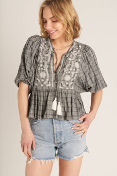 Embrace your inner dreamer in our Such a Dreamer Peplum Top. This plaid top features playful puff sleeves and intricate embroidery, adding a whimsical touch to your look. Perfect for those who love to dream big (and look good while doing it). 100% Rayon true to size (d cup or larger go up 1 sz) Bohemian Cotton Tops With Puff Sleeves, Bohemian Cotton Puff Sleeve Tops, Embroidered Puff Sleeve Tops For Fall, Plaid Cotton Top With Puff Sleeves, Plaid Puff Sleeve Cotton Top, Floral Embroidered Puff Sleeve Tops For Fall, Puff Sleeve Tops With Floral Embroidery For Fall, Floral Embroidery Puff Sleeve Tops For Fall, Fall Floral Embroidery Puff Sleeve Tops