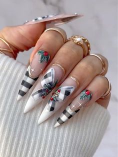 Holiday Glamour on Your Fingertips 🎄✨ Get ready for the season with these enchanting Christmas-themed press-on nails! Designed to capture the essence of holiday elegance, these nails are perfect for anyone who wants to add a festive touch to their look. Classic Buffalo Plaid Pattern 🖤🤍 The striking black-and-white buffalo plaid pattern brings a cozy winter vibe, perfect for pairing with your favorite winter outfits. Each plaid detail is meticulously crafted, adding a touch of timeless holiday style to your nails. Elegant Bow and Pine Accents 🎀🌲 Featuring delicate 3D bows and lifelike pine accents, these nails add a luxurious, festive feel. The subtle shimmer of the bows, paired with the rich green pine details, creates a sophisticated Christmas look that stands out at any holiday gath Holiday Nail Designs, Plaid Nails, Christmas Nail Art Designs, Holiday Nail Art, Coffin Nails Long, Festival Nails, Xmas Nails, Christmas Nail Designs