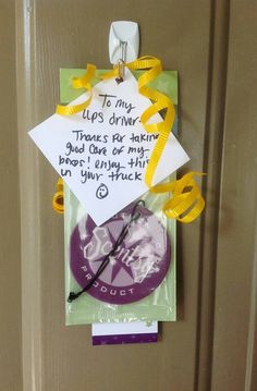 a door hanger with a note attached to it