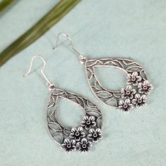 Indian Oxidized Silver Floral Drop Earrings | Teardrop Flower Earrings | Elegant Jewelry for Women | Oxidized Long Earrings Pakistani Jhumki Elevate your style with our exquisite Floral Drop Earrings, designed to bring a touch of elegance and charm to any outfit. Featuring a stunning teardrop flower design, these earrings are perfect for adding a graceful touch to both casual and formal looks. Charming Design: These earrings showcase a beautifully crafted floral motif with a teardrop shape that adds a sophisticated flair. The intricate flower design is detailed with delicate patterns, making each piece a unique and eye-catching accessory. Versatile and Elegant: Ideal for a wide range of occasions, from everyday wear to special events, these earrings complement a variety of outfits. Whether Teardrop Earrings With Flower Charm, Metal Teardrop Flower Earrings, Indian Earrings, Oxidized Silver, Elegant Earrings, Elegant Jewelry, Elegant Gift, Long Earrings, Flower Earrings