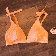 Women’s Bikini Top Size Large. Orange And White Strips By Time And Tru. New With Tags. Please Let Me Know If You Have Question. Thank You For Shopping! Mel Lined Triangle Top Tankini For Sunbathing, Striped Triangle Top Swimwear, Bra Friendly, Striped Triangle Top Swimwear Bra Friendly, Striped Triangle Halter Top For Beach, Striped Triangle Halter Top For Vacation, Lined Triangle Top Swimwear For Beach Party, Striped Halter Top For Beach Season, Summer Striped Halter Top For Beach Season, Striped Summer Halter Top For Beach Season