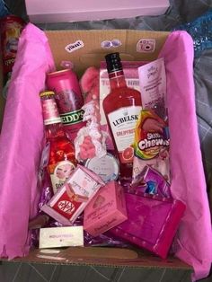 a pink box filled with lots of different items