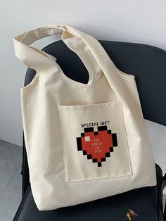 BirdinBag - Stylish Pixel Heart Pattern Canvas Tote: A Fashionable Statement Pixel Heart, Beige Pattern, Heart Pattern, Shoulder Tote Bag, Heart Patterns, Shoulder Tote, Canvas Tote, Special Gifts, Size Medium