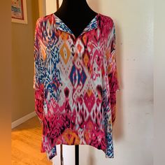 100% Polyester Fabric, Bright Multi Color Fabric, Short Crop Sleeve, Split Neckline, Flat Measurements: P To P 32’ Length 26’ Relaxed Fit Long Sleeve Top For Beach Cover-up, Casual Multicolor V-neck Tunic, Flowy V-neck Tops For Beach Cover-up, Vibrant Print V-neck Tunic, Spring Multicolor V-neck Tunic, Colorful V-neck Blouse For Beach, Multicolor Print Long Sleeve Tops For Vacation, Colorful V-neck Blouse For Vacation, Spring Long Sleeve Beach Cover-up Blouse