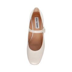 Steve Madden Women's Heels | SESSILY Bone Patent Make it a mary-jane! SESSILY is the perfect beige ballet heel. Crafted with a low block heel for a touch of height, this tonal low heel is perfect for day to day wear. The buckle closure adds a coquette touch to the classy almond toe, just add socks! Synthetic patent upper material Synthetic lining and sole Top strap with buckle closure 1.5" heel height Loafers Trend, Ballet Heels, Monochrome Design, Patent Heels, Business Shoes, Trainer Heels, Loafer Mules, Low Block Heels, Women's Heels