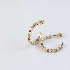 Rainbow sapphire hoop earring in 14K solid gold in bezel setting. Unique eternity solid gold hoops for women. The best birthday gift for her!100% handcrafted with love!PRODUCT DETAILS• Metal: 14K solid gold, 14K white gold or 14K rose gold• Gemstone: 26 Sapphires, Round cut• Sapphires' Weight: 0.97ct totalHOW TO ORDER - CUSTOM ORDERS• Choose from the drop-down menus the available options (Material) and leave us a note for any special requirements.• For special orders (if you wish the ring to mat Gold Multi-stone Hoop Earrings As A Gift, 14k Gold Gemstone Hoop Earrings, Yellow Gold Hoop Earrings With Birthstone, 14k Gold Huggie Jewelry With Bezel Setting, Gold Multi-stone Hoop Earrings, Yellow Gold Hoop Earrings With Birthstone For Anniversary, Anniversary Multi-stone Hoop Earrings, Anniversary Yellow Gold Hoop Earrings With Birthstone, Gold Hoop Earrings With Birthstone In 14k Gold