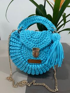 Crochet blue handbag. Shoulder Bag. Blue Pouch Shoulder Bag With Top Carry Handle, Blue Top Handle Shoulder Bag With Braided Handles, Blue Pouch Shoulder Bag With Handles, Blue Top Handle Bags With Braided Handles, Blue Bags With Braided Top Handles, Light Blue Crossbody Shoulder Bag, Light Blue Crossbody Bag With Handles, Blue Satchel Bag With Braided Handles, Light Blue Top Handle Shoulder Bag