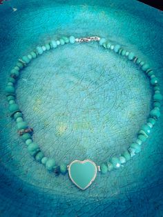 "A unique delicate and colorful necklace made of heart shape pendant, raw Turquoise stones, and various Turquoise crystals combined all together and connected to a silver heart. It is a very unique piece I made in order to get the Ocean style essence and it's a unique shape. OOAK necklace I made with love This piece is 100% HAND MADE AND DECORATED. All of my items are handmade by \"mylittlebride\" Efrat Davidsohn. Your necklace will get to you in a beautiful gift box with a tiny ribbon. Enjoy!" Turquoise Crystals, Style Essence, Silver Earrings Wedding, Ocean Style, Raw Turquoise, Bridal Jewelry Vintage, Natural Stone Necklace, Turquoise Crystal, Bridal Earrings Pearl