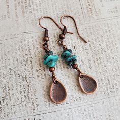 Artisan Stacked Turquoise Copper Teardrop Dangle Earrings EARRINGS ONLY Boho. I hung small copper alloy teardrops from a rustic stack of turquoise beads which fall from your choice antiqued copper earwires to make a pair of adorable dangle earrings.  You get Boho vibes, you get rustic vibes, you even get a Southwestern feel with the Turquoise.   If the teardrop pendant necklace in a few images speaks to you here is a direct link, https://magpiemadnessjewelry.etsy.com/listing/1758205629 REPEAT CU Turquoise Beaded Copper Earrings, Handmade Turquoise Earrings With Copper Wire, Turquoise Dangle Earrings With Patina, Turquoise Copper Dangle Jewelry, Turquoise Round Copper Earrings, Turquoise Boho, Teardrop Dangle Earrings, Boho Vibe, Turquoise Beads