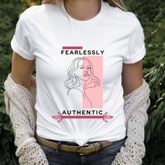 PRODUCTION TIME:  1-3 days (Usually 2 days) SHIPPING TIME:  2-5 days (Usually 3 days) PRODUCT DESCRIPTION:  Fearlessly Authentic shirt, Motivation shirt Bella Canvas Unisex T-shirt Super soft cotton and excellent quality print makes. 100% Soft cotton (fibre content may vary for different colors) Light fabric (4.2 oz/yd² (142 g/m Runs true to size Our Relaxed Fit Tee (Bella + Canvas style 3001) is a unisex style that runs a touch small for men, and about a half a size large for women. It's a relaxed fit and is soft and cozy. *For T-shirt Sizes Please refer to the Listing Image. CARE INSTRUCTION:  Machine wash: warm (max 40C or 105F); Non-chlorine: bleach as needed; Tumble dry: low heat; Iron, steam or dry: medium heat; Do not dry-clean PRINTING METHOD:  DTG printing method is used for these Inspirational Graphic Print T-shirt For Everyday, Inspirational White T-shirt For Everyday, Empowering Graphic Cotton T-shirt, Empowering Cotton T-shirt With Graphic Print, White Inspirational Relaxed Fit T-shirt, Inspirational Graphic Print Top For Streetwear, Inspirational Graphic Print Tops For Everyday, Inspirational Everyday T-shirt With Graphic Print, Empowering Text Print Crew Neck T-shirt