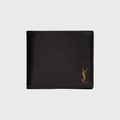 Saint Laurent wallet in smooth calf leather with metal YSL monogram in the corner. Interior: two bill compartments, eight card slots, two receipt pockets. Approx. 3.7"H x 4.3"W x 0.9"D. Made in Italy. Saint Laurent Wallet, East West, 7 H, Continental Wallet, Calf Leather, Card Slots, Slots, Saint Laurent, Tops Designs