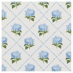 a blue and white wallpaper with flowers on it