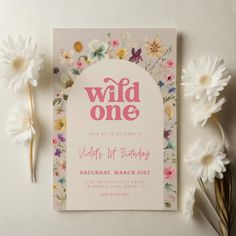 a wild one birthday party with daisies and flowers