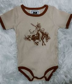 The Whole Herd Coyote Bronc Ribbed Infant Bodysuit has incredible quality and is perfect for boys and girls! The ribbed bodysuit is 100% cotton and is both soft and durable. This USA designed and printed tee is a great choice, complete with a tagless neck label. Your little one will love showing off their western style. Tagless Neck Label 100% Cotton True To Size Unisex Soft 3M/6M/12M/18M Western Baby, Western Babies, Cool Kids Clothes, Baby Room Inspiration, Baby Inspiration, Baby Fits, Rustic Baby, Baby Cowboy