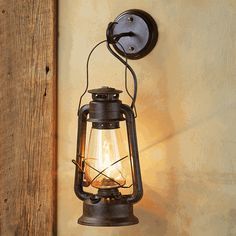 an old fashioned lantern light on the wall