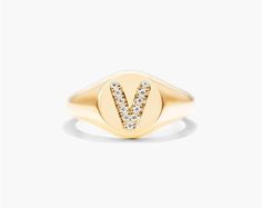 14K Yellow Gold Diamond V Initial Signet Ring. This timeless ring will dazzle all who see it. Perfect for any age and occasion, this ring makes the perfect individualized gift! Vs Clarity Round Cut Initial Ring For Anniversary, Anniversary Initial Ring With Vs Clarity Round Cut, Fine Jewelry White Gold Initial Ring With Vs Clarity, Luxury Engraved Ring With Vs Clarity, Gold Initial Ring With Brilliant Cut For Formal Events, Gold Initial Ring With Brilliant Cut For Formal Occasions, Classic Gold Initial Ring With Brilliant Cut, Oval Initial Ring In White Gold With Vs Clarity, Gold Signet Ring With Brilliant Cut For Gift