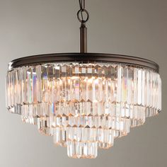 a crystal chandelier hanging from a ceiling