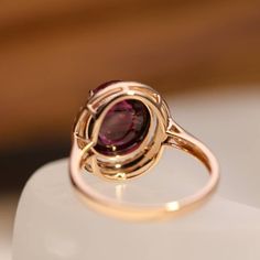 10.5x9.5mm Natural Purple-Red Touname Ring, Oval Cabochon Tourmaline Ring with Real Natural Diamond Halo, 18K solid Rose Gold Gemstones: Natural Tourmaline, Diamonds Size: 10.5 x 9.5 x 4.96mm Metal: 18k Solid Rose Gold 》Packaging 《 All jewelry is packed by me in an elegant Gift Box. 》How we ship《 - FREE PRIORITY SHIPPING - United States delivery will take 3-10 Days after Shipment. - Other countries delivery will take 5-15 Days after Shipment. I hope all of your questions are answered to your sat Rose Gold Ruby Ring Oval, Oval Cabochon Amethyst Ring, Oval Ruby Ring In Rose Gold With Bezel Setting, Rose Gold Oval Cabochon Ring, Rose Gold Cabochon Oval Rings, Oval Rose Gold Tourmaline Ring, Rose Gold Oval Tourmaline Rings, Formal Rose Gold Oval Cabochon Ring, Oval Tourmaline Ruby Ring For Formal Occasions