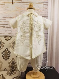 "Ivory Color comes with 4 pieces Baby Boy Any Occasion Outfit It is perfect for Any Elegant Occasion, Parties in Gardens or in the beach, blessing or any special occasion Comes with: -Shirt -Jumper -Sash -Beret Measurements are in inches: Size 3-6 months, Jumper (waist 15\", long 21\") Shirt (Shoulder to shoulder 8.5\") Size 6-12 months, Jumper (waist 18\", long 23\") Shirt (Shoulder to shoulder 8.5\") Size 12-18 months, Jumper (waist 18\", long 24\") Shirt (Shoulder to shoulder 9\") Size 18-24 White Embroidered Baptism Sets, White Embroidered Sets For Baptism, Fitted Embroidered Sets For Baptism, Elegant Embroidered Baptism Sets, Fitted Beige Sets For Baptism, Elegant Beige Sets For Baptism, Elegant Beige Baptism Set, Elegant Cream Sets For First Communion, Elegant Cream First Communion Sets