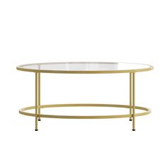 an oval glass table with gold metal legs