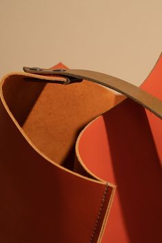 Free USA shipping. 15-30 USD international shipping. All work is made to order. Please allow 5-7 days for me to cut and sew your pieces. Thick, firm, smooth papaya orange leather bag. Modern and gorgeous. Specifications Simple unlined shoulder bag in bright papaya orange leather. Brown leather strap, medium length, finished with double screws and an interior keyring. Suede texture on strap interior keeps bag on your shoulder. Approximate measurements: 10in = 10"w x 22" overall drop 13in = 13"w x Modern Orange Everyday Shoulder Bag, Modern Orange Leather Shoulder Bag, Orange Leather Bucket Bag For Travel, Modern Orange Bucket Shoulder Bag, Orange Leather Bucket Bag For Shopping, Orange Leather Bucket Bag For Everyday Use, Modern Orange Bucket Bag, Orange Leather Bucket Shoulder Bag, Orange Leather Shoulder Bucket Bag