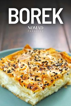 a plate with some food on it and the words borek nomad paradise