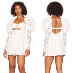 For Love & Lemons Frances Puff Sleeve Mini Dress Size: Large New With Tag Color: White Sold Out Online. Self: 100% Polyester. Lining: 98% Recycled Polyester, 2% Spandex. Dry Clean. Fully Lined. Unpadded Wired Cups With Front Tie. Hidden Back Zipper And Adjustable Hook And Eye Closures. Puff Sleeves. Front Cut-Out. Zipper Detail At Cuffs. Lace Fabric Overlay. Shoulder Seam To Hem Measures Approx 30" In Length Balloon Sleeve Mini Dress For Wedding, White Lantern Sleeve Dress For Date Night, Puff Sleeve Dress With Sweetheart Neckline For Brunch, White Lace Puff Sleeve Dress For Spring, Lace Puff Sleeve Dress For Brunch, Lace Mini Dress With Puff Sleeves For Wedding, White Balloon Sleeve Mini Dress For Brunch, Chic Lace Mini Dress With Puff Sleeves, For Love And Lemons Jackson Mini Dress