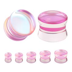 a set of pink and white containers with lids