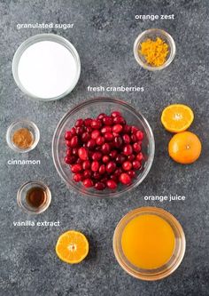 ingredients to make cranberry orange juice laid out on a gray surface with text