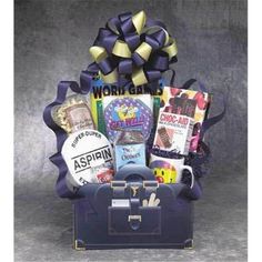 a suitcase filled with assorted items and a purple ribbon on the top, sitting in front of a gray background