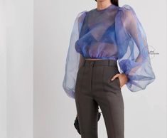 Hot Blue color. Colored design long sleeve organza Blouse . Transparent organza stylish girls Blouse . Sheer Blue organza Blouse For her XS----BUST:- 32, WAIST:-24, HIP:-34 S----BUST:- 34, WAIST:-26, HIP:-36 M----BUST:- 36, WAIST:-28, HIP:-38 L----BUST:- 38, WAIST:-30, HIP:-40 XL----BUST:- 40, WAIST:-32, HIP:-42 XXL----BUST:- 42, WAIST:-34, HIP:-44 𝐂𝐚𝐫𝐞 𝐈𝐧𝐬𝐭𝐫𝐮𝐜𝐭𝐢𝐨𝐧𝐬: *Dry Clean only *Do not soak in water 𝐍𝐨𝐭𝐞: 𝐏𝐫𝐨𝐝𝐮𝐜𝐭 𝐜𝐨𝐥𝐨𝐮𝐫 𝐦𝐚𝐲 𝐬𝐥𝐢𝐠𝐡𝐭𝐥𝐲 𝐯𝐚𝐫𝐲 𝐝𝐮? Blue Organza, Hot Blue, Organza Blouse, Organza Top, Sheer Shirt, Girls Blouse, Blouse Online, Women Shirts Blouse, Stylish Girl