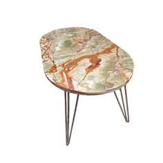 a small table with metal legs and a marble design on the top, against a white background