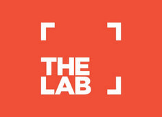 the lab j logo with white letters on an orange and red background that reads,'the lab j '