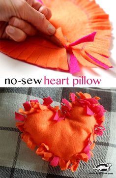 someone is making a heart pillow out of felt and then it's sewn