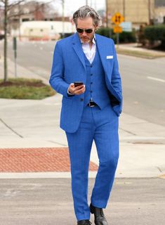 Stride into an incredibly versatile avenue with our Italian Prato Electric Blue Herringbone Linen Suit. Meanwhile, wear our pure linen suit that gives off a lightweight, calm and savory smooth texture with a precious herringbone weave over blue hues. Also, the aptly tailored suit that highlights a natural fit and gives off a spacious feel. Likewise, it takes on classic tailoring to deliver a modern silhouette, giving it an enticing and unique design. Lastly, a go-to choice to make a bold impress Classic Blue Linen Suits, Classic Blue Linen Suit, Fitted Blue Linen Suit, Blue Fitted Linen Suit, Tailored Blue Linen Suit, Blue Linen Suit For Workwear, Blue Linen Suit For Work, Semi-formal Slim Fit Linen Suits, Blue Linen Suits For Business Casual