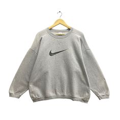 Code : 188 Vintage 90s Nike Swoosh Soft Grey Sweatshirt Medium Nike Center Crewneck Nike Swoosh Sweater Pullover Nike Swoosh Center Print Logo Jumper Size on Tag :  M Details Measurement  Arm Pit to Arm Pit : 28"inches Back Collar to Hem : 27"inches Condition :  Great Vintage Condition(Used Clothing).No Holes And No Stain.Please refer pictures detail.‼️ Pull Nike, Vintage Nike Sweater, Bday List, 90s Nike, Nike Sweater, Nike Sweatshirts, Nike Swoosh, Sweater Pullover, Used Clothing