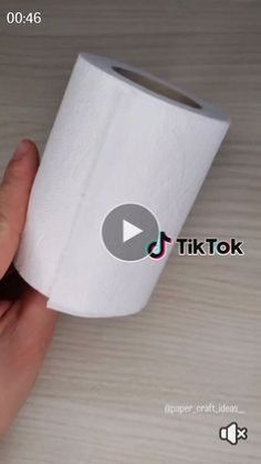 a person holding a roll of toilet paper in their hand with the text tiktok on it