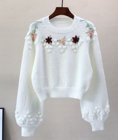 Sweet white flowers long sleeve sweaterFabric: blendedColor: whiteSize(cm): free sizelength 47 bust 106 waist 84 sleeve length 56 White Floral Embroidered Long-sleeved Sweater, White Long Sleeve Sweater With Floral Embroidery, Cozy Long Sleeve Sweater With Floral Embroidery, Spring Floral Print Long Sleeve Sweater, Long Sleeve Floral Print Sweater For Spring, White Floral Embroidery Sweater For Winter, White Floral Embroidery Winter Sweater, White Winter Sweater With Floral Embroidery, Cozy Winter Sweater With Floral Embroidery