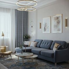 a living room with a blue couch and coffee table in front of a large window