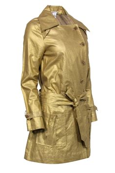 This Diane von Furstenberg trench coat is a stunning addition to any wardrobe. Its gold metallic hue gives it a unique and eye-catching quality, while the linen shell keeps it lightweight and comfortable. Perfect for dressing up or down, this coat is sure to become a staple in your collection. Size 6 Shell 100% Linen Gold-metallic Belted Two slip-in pockets Acrylic button closure Bust 38” Waist 32” Sleeve length 24” Shoulder to hem 35.5” Shoulder to shoulder 15” Gold Outerwear For Work In Spring, Luxury Gold Outerwear For Spring, Chic Gold Outerwear For Spring, Designer Gold Outerwear For Fall, French Girl Chic, Chic Shop, Buy Shoes Online, French Girl, First Lady